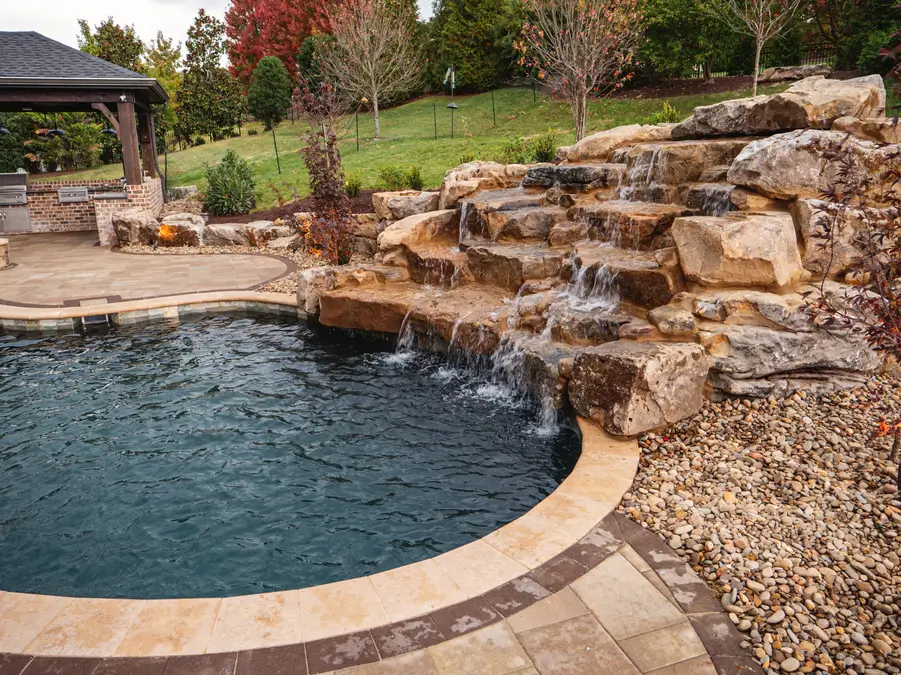 11 Unique Waterfall Pool Ideas | Transform Your Backyard into a Tranquil Oasis