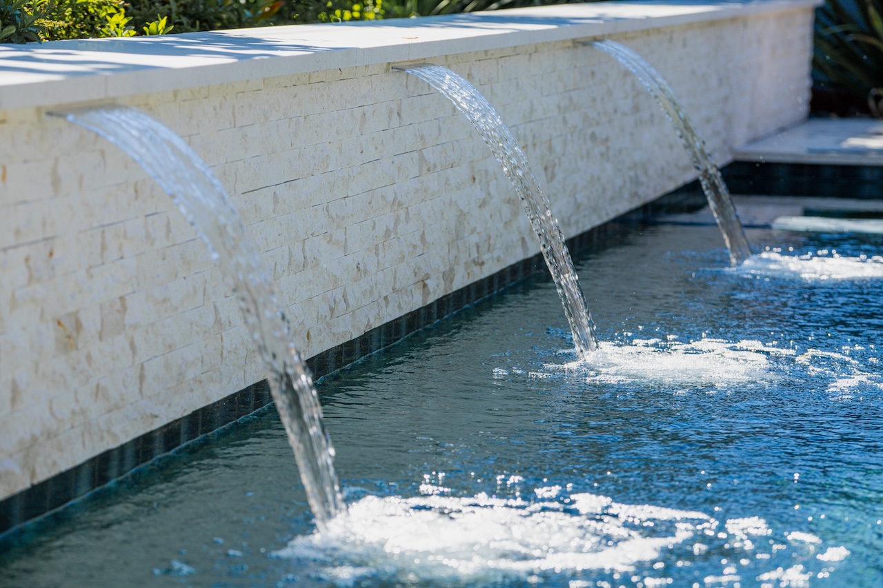 Different Types of Waterfalls to Complement Your Pool - Oasis Pavers and Pools