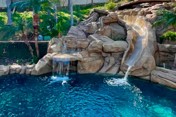 Rock Pool Features: Waterfalls vs Slides vs Grottos Guide