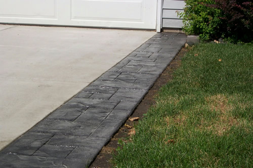 stamped colour concrete border - Stoneage Concrete