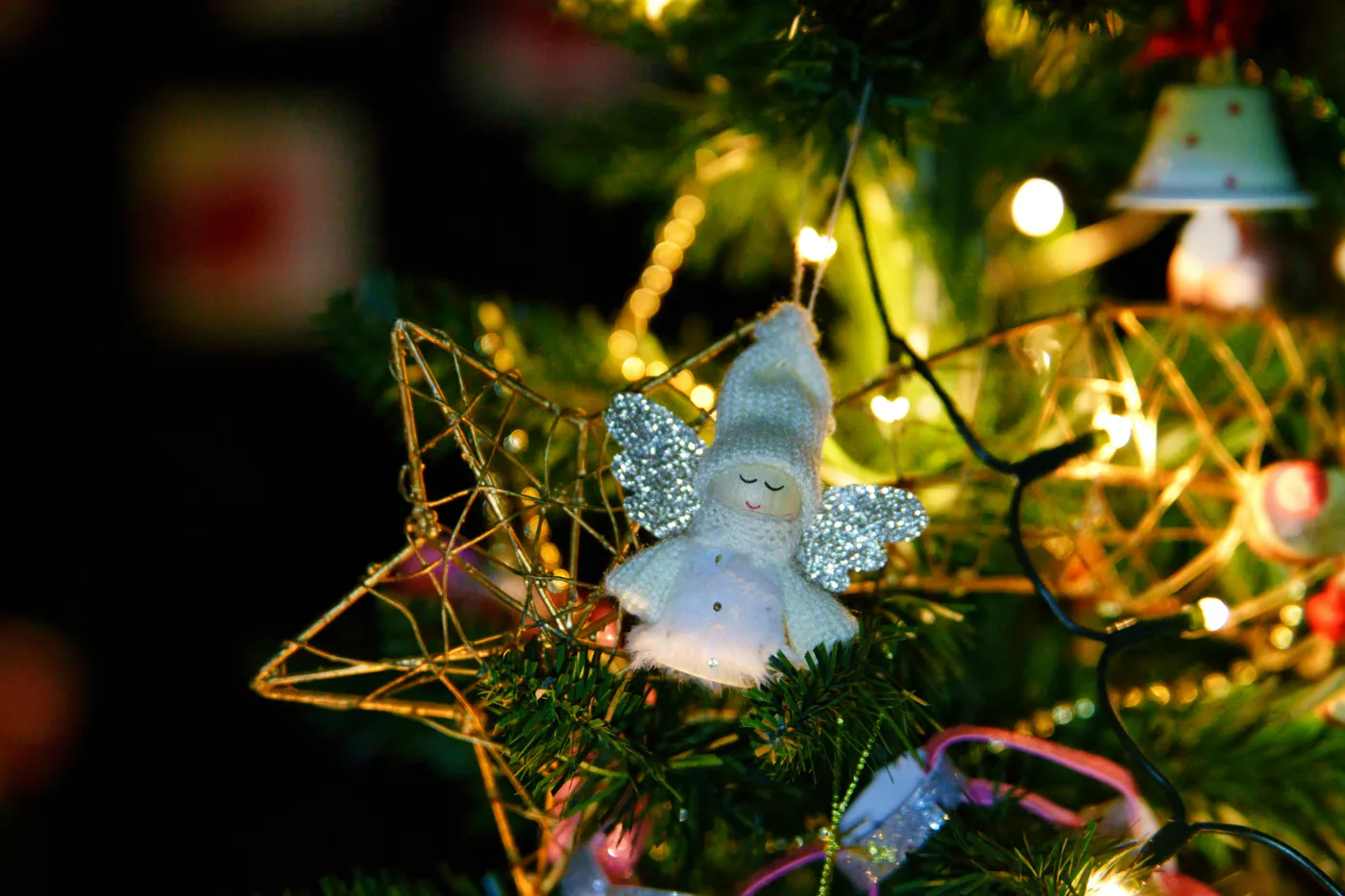 A close up of a christmas tree with ornaments