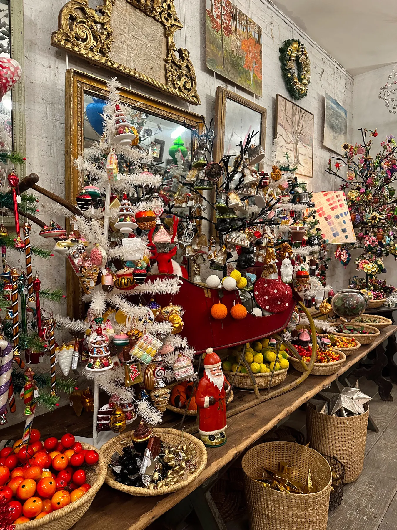 A festive arrangement of vintage Christmas decorations in a store display.