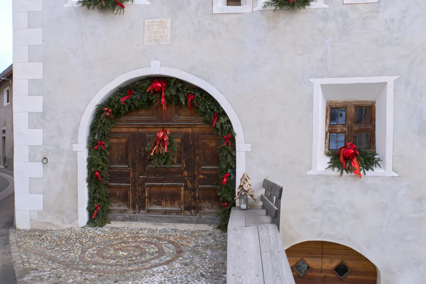 A typical Engadine house, decorated for Christmas