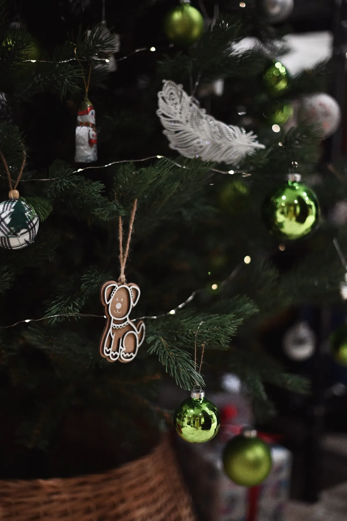 Beautiful Christmas tree decorated with ornaments and lights, creating a festive holiday atmosphere.