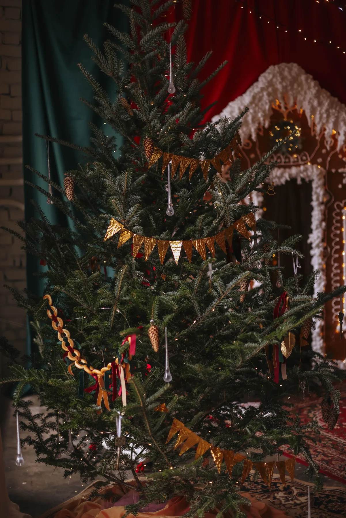 Beautifully decorated Christmas tree indoors with festive ornaments.