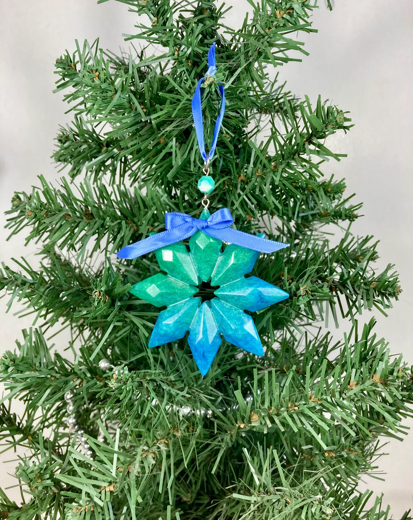 Blue & Green Resin Snowflake Ornament with Glass Bead and Blue Ribbon –  Handmade | faemoonwolfdesigns