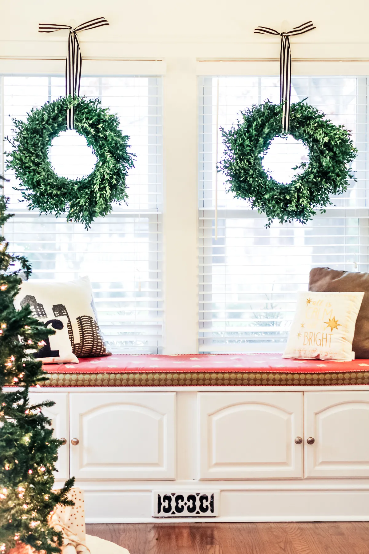 boxwood-wreaths-hanging-in-windows - Shining on Design