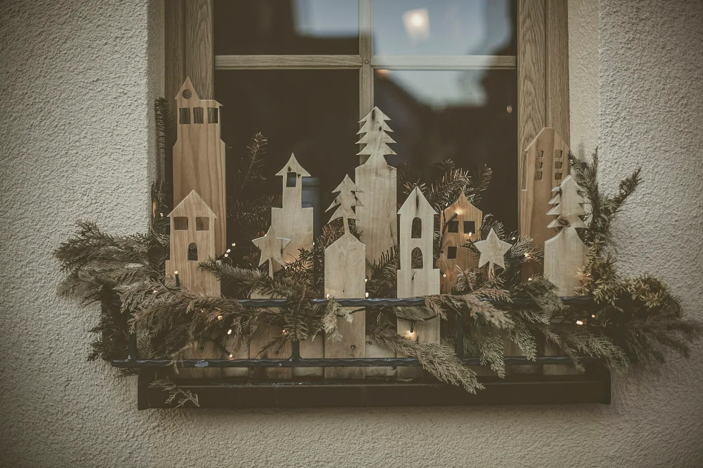 Branches with green ornaments on vintage crates by window - Free Photo on  Unsplash