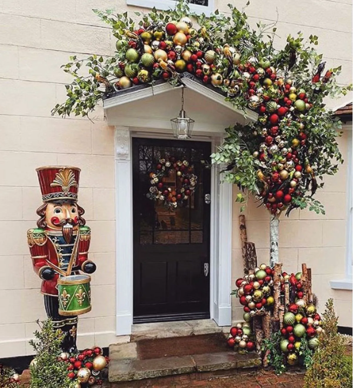 Celebs' most outrageous Christmas door displays with glitzy wreaths and giant Nutcrackers - The Mirror