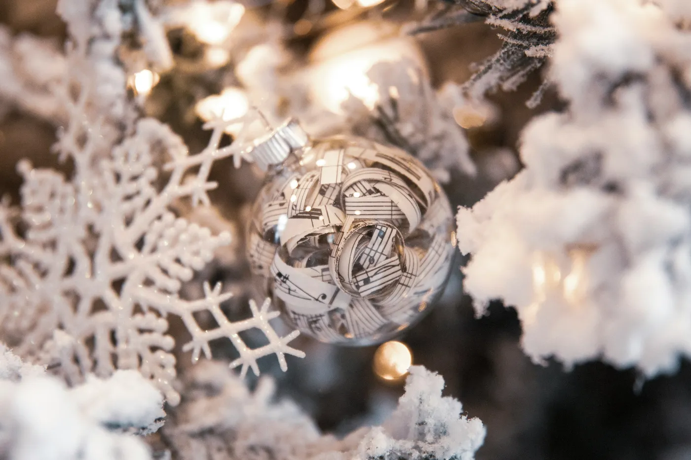 Christmas globe filled with music notes