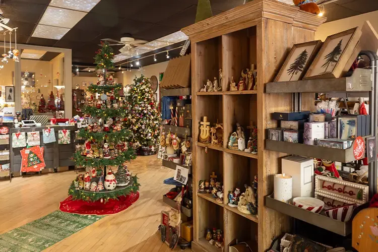 Christmas Tree Shop Interior Christmas Gift Shop Interior With Wrapped  Presents, Decorations, And Large Holiday Tree