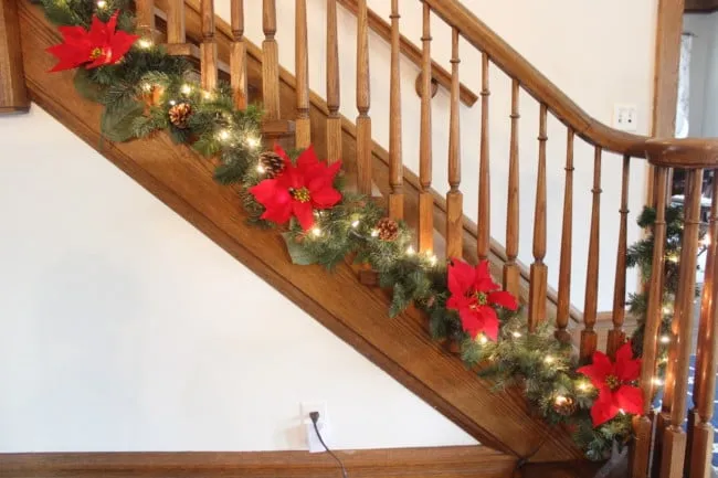 Easy and Inexpensive Christmas Stair Garland - Momcrieff
