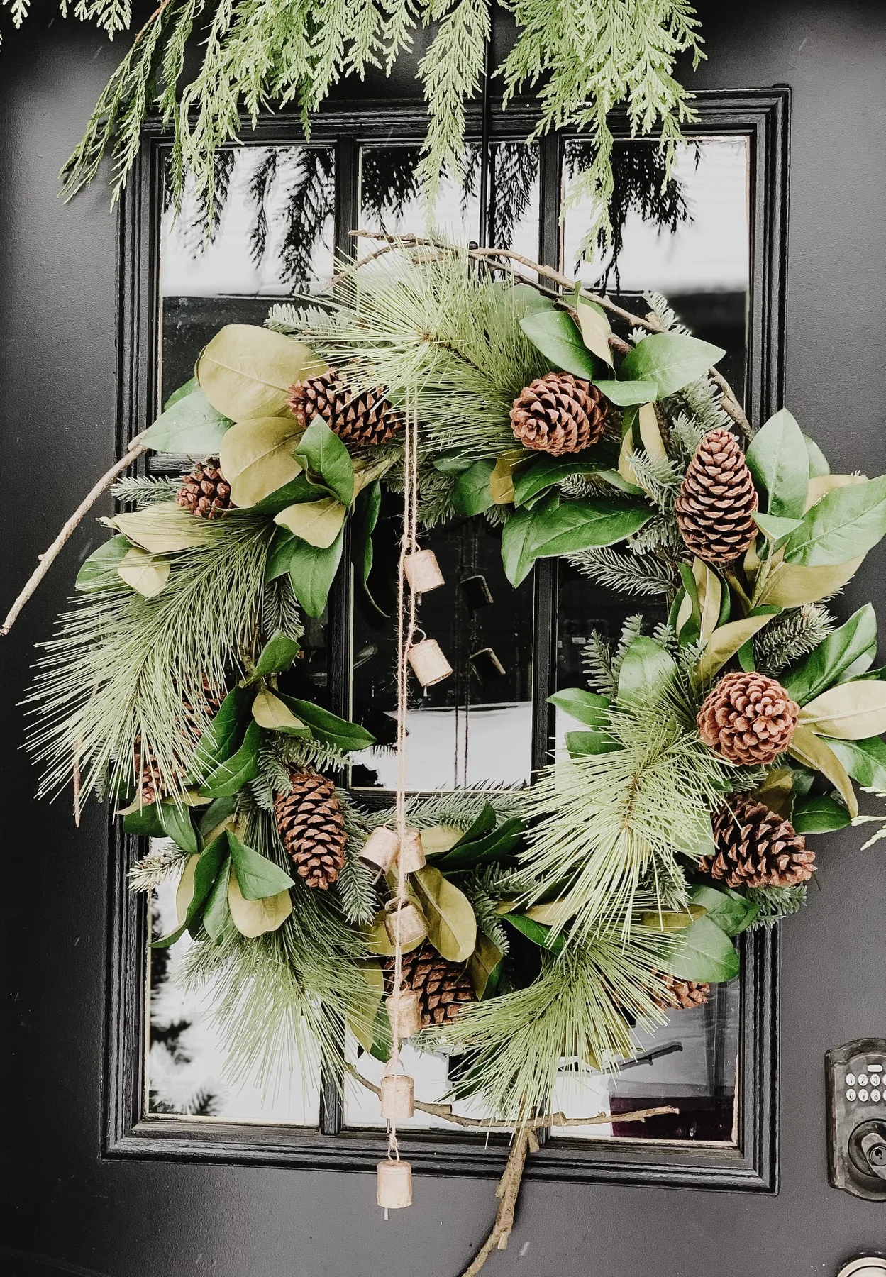 Easy & Simple DIY Jingle Bell Garland - Krista Gilbert