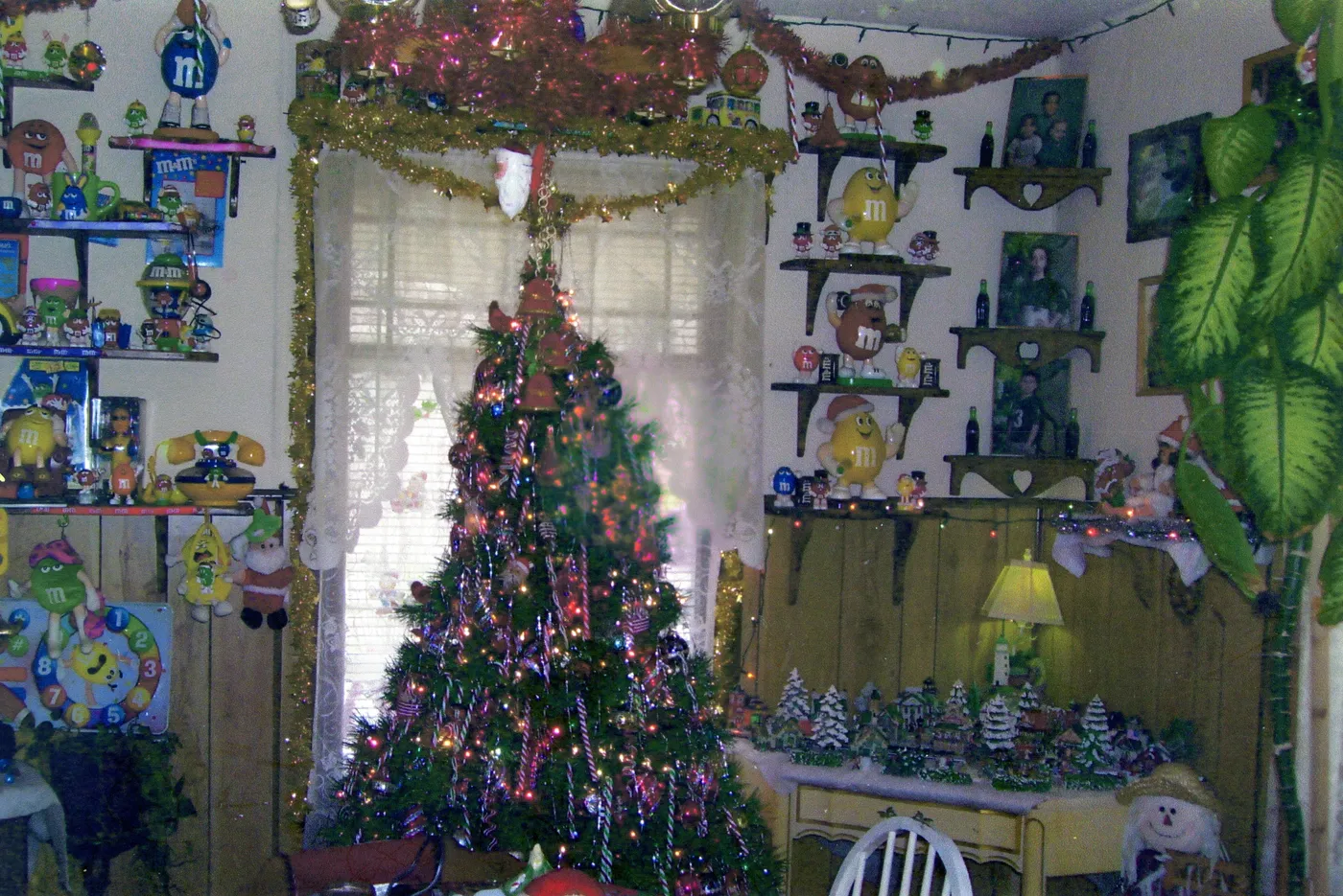 Festive room with a large, decorated christmas tree
