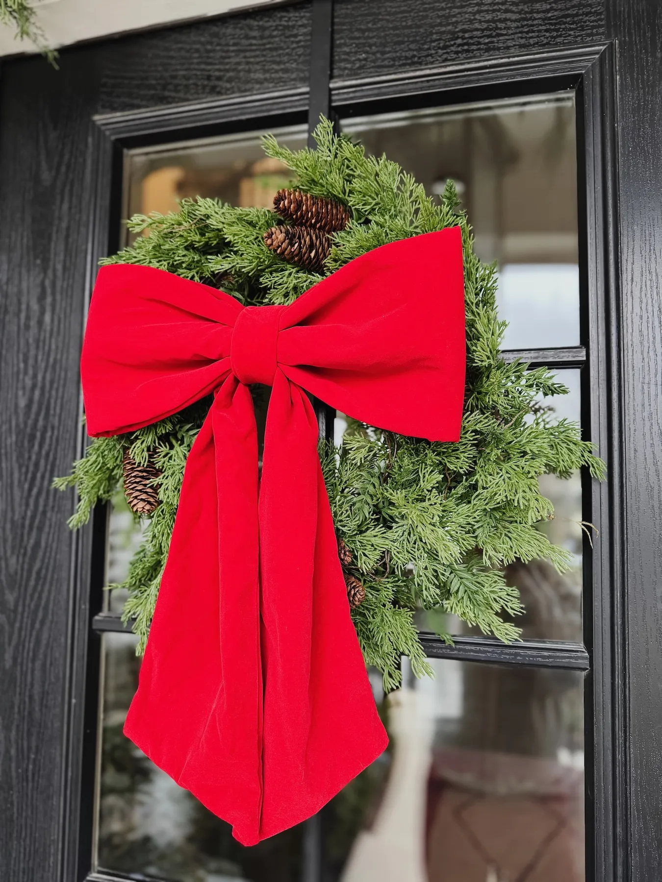 How to Create a Cozy Holiday Porch with Faux Trees and Garland - Life Love Larson