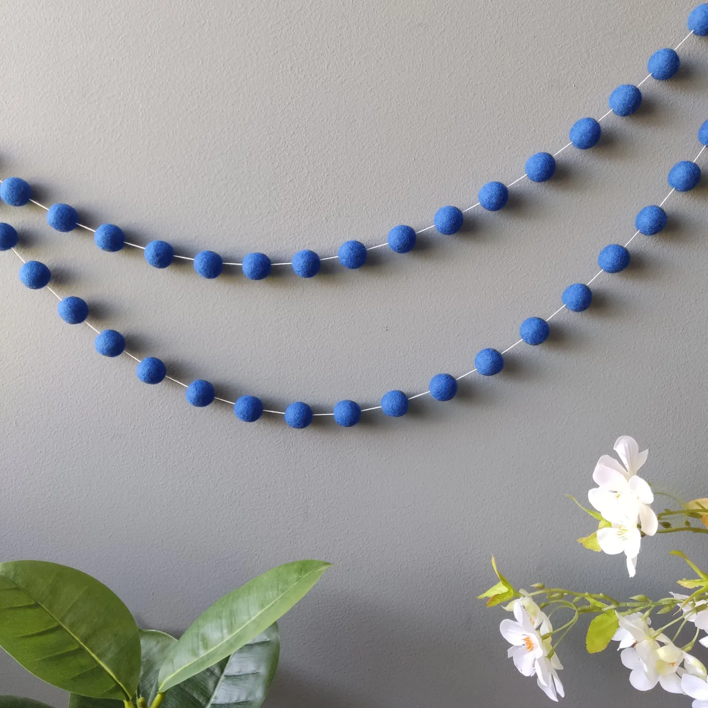 Indigo blue intense monochrome felt ball garland decoration | CELAINEDECO