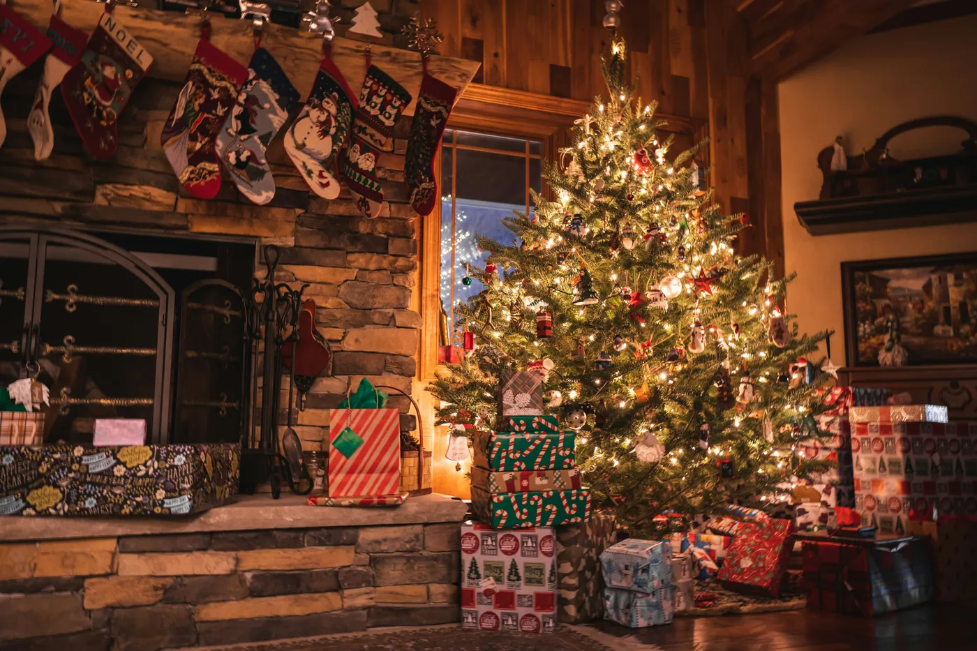 Presents left under the tree at a cottage in the woods.