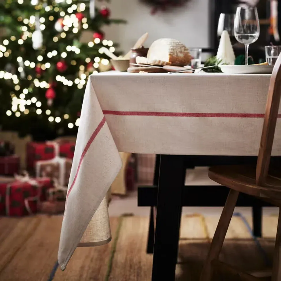The $30 'Vinterfint' Red-Trimmed Tablecloth From IKEA Brings Classic Holiday Charm to Your Dining Room