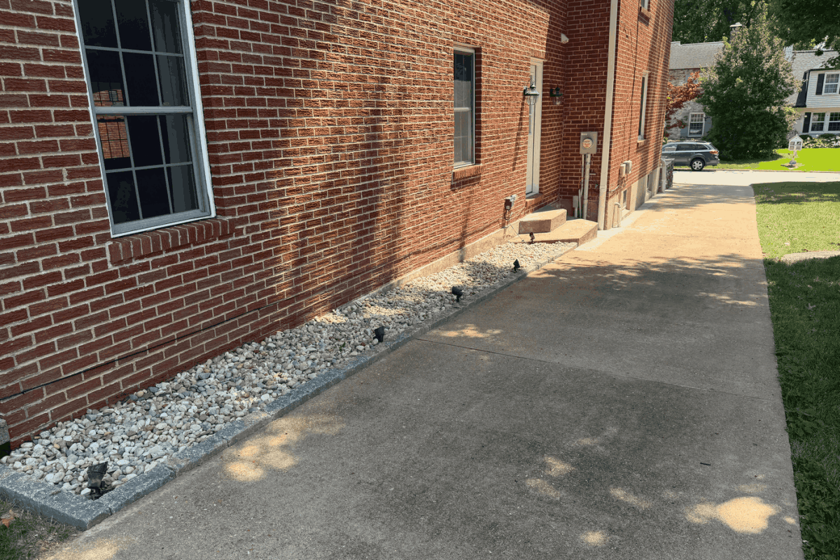 Underground Downspout Drainage to Move Water Away From a St. Louis Home
