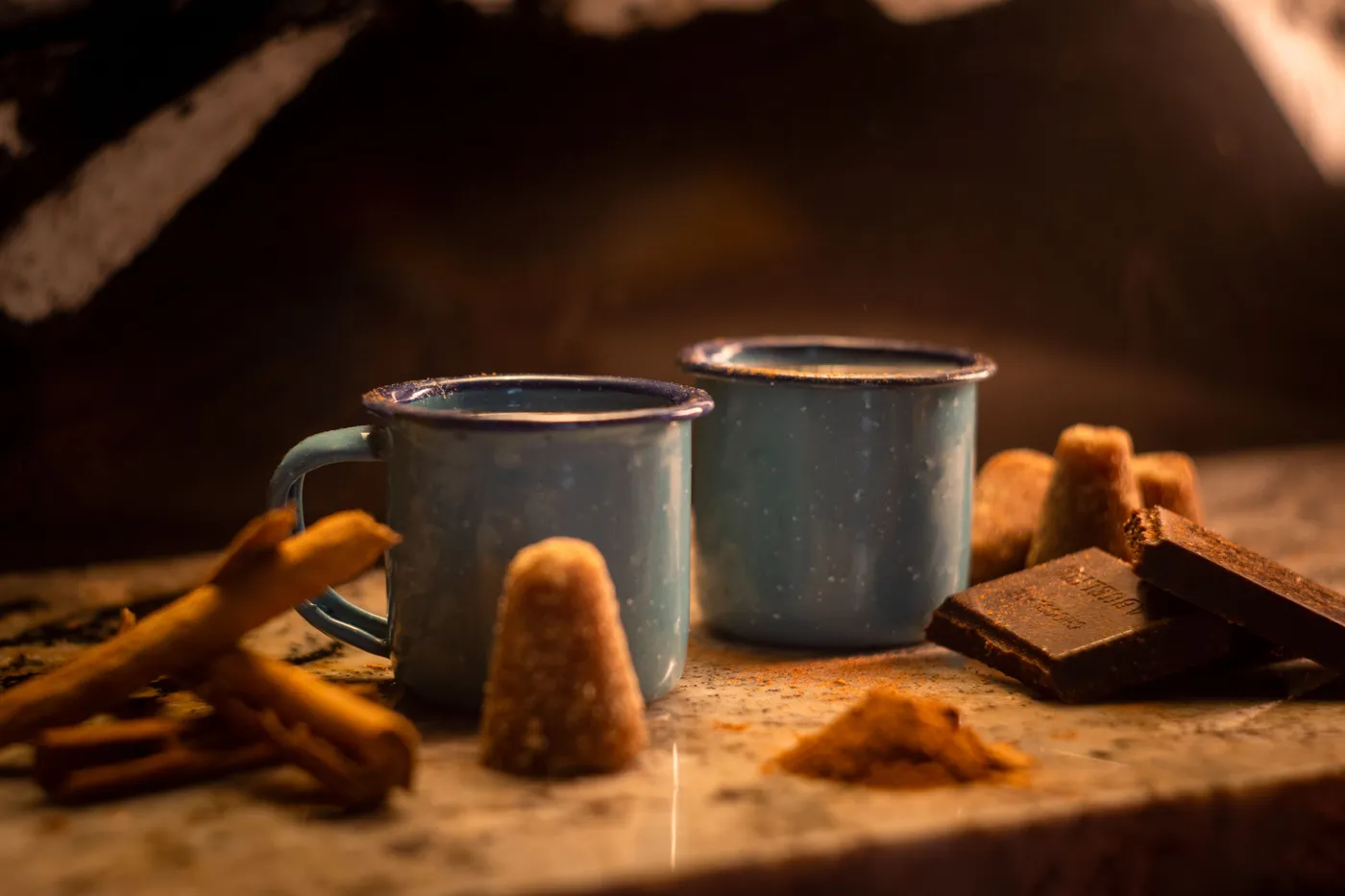 Warm Mexican cups with traditional ingredients like chocolate and cinnamon, perfect for cozy moments.